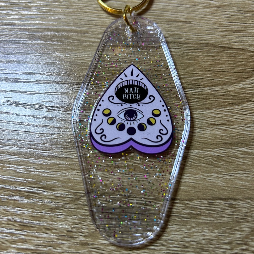 Nah B- Ouija cloche keychain - clear glitter
